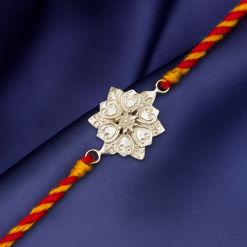 Silver rakhi with red and yellow 